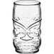 A clear glass tumbler with a face on it.