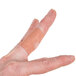A person with a Medique woven knuckle bandage on their finger.