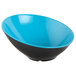 A blue and black slanted melamine bowl.
