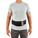 A man wearing an Ergodyne ProFlex weight lifters back support belt with a black buckle.
