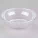 A clear bowl with a textured surface on a white background.