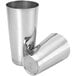 A close-up of two silver Barfly shaker cups with a lid.