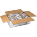 A white box with foil wrapped around it containing Rich's Allen Un-Iced Round Chocolate Layer Cakes.