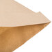 A package of 7 brown paper Hoover Type BP vacuum bags.