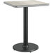 A square Lancaster Table & Seating table with a black base and pole.