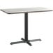 A Lancaster Table & Seating white rectangular table top with black base.
