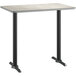A white rectangular Lancaster table top with black and white reversible sides on a black table base.