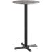 A Lancaster Table & Seating bar table with a gray and white reversible top on a black base.