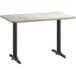 A white rectangular table top with a gray edge and black base.