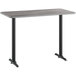 A rectangular Lancaster Table & Seating bar table with black legs and a gray top with a white border.