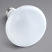 A TCP Elite dimmable LED light bulb with a white base and white covering on a gray surface.
