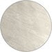 A round white laminated table top with a few marks.