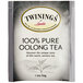 A box of Twinings Pure Oolong Tea Bags with a label.