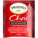 A red Twinings Chai Decaffeinated Tea Bag package with white text.