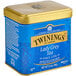A blue and gold Twinings Lady Grey tea tin.