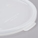 A white plastic lid for a Cambro round crock.
