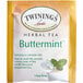 A yellow and white box of Twinings Buttermint Herbal Tea Bags.