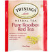 A red and white box of Twinings Pure Rooibos Herbal Tea Bags.