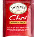 A red box of Twinings Pumpkin Spice Chai Tea Bags with a close-up of a tea bag.