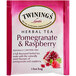 A pink and white box of Twinings Pomegranate & Raspberry Herbal Tea Bags.