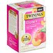 A box of Twinings Superblends Glow+ Peach & Aloe Vera White Tea Bags with a peach on the front.