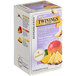 A box of Twinings Focus Ginseng, Mango & Pineapple Herbal Tea Bags with a label featuring pineapple and mango.