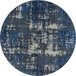 A blue and white circular Joy Carpets area rug with a pattern.