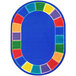 A multi-colored oval area rug with a rainbow border and a circle in the middle.