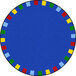 A round blue rug with colorful squares on it.