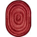 A red oval rug with a white spiral design.
