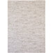 A white area rug with a beige and light gray pattern.