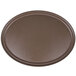 A brown oval Carlisle Griptite non skid fiberglass serving tray.