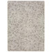 A Joy Carpets Hazelwood rectangular area rug with a white and grey floral pattern.
