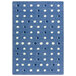 A blue and white rectangular area rug with white dots.