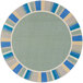 A round sage green rug with a blue and yellow border.