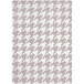 A taupe rectangular area rug with a grey and white houndstooth pattern.