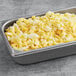 A metal pan filled with Papetti's diced hard cooked eggs in it.