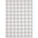 A white and grey houndstooth rug.