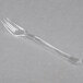 A WNA Comet clear plastic tasting fork.