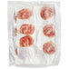 A plastic bag of Smithfield fully cooked round bacon slices on a white surface.