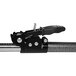 A black and silver steel pick-up truck cargo bar with a black handle.