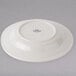 A white Tuxton pasta bowl with a wide rim and a rolled edge.