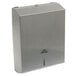 A stainless steel rectangular paper towel dispenser with a hole in the front.