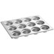 A silver Baker's Mark jumbo muffin pan with 12 cupcake holders.