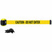 A yellow Banner Stakes wall mount barrier with black text reading "Caution - Do Not Enter" and a yellow and black tape.