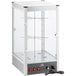 A glass and metal Carnival King countertop churro display warmer with a glass door.