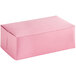 A pink Baker's Mark bakery box with white background.