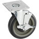 A black and grey swivel caster with a metal plate.