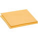 A stack of yellow Kraft American cheese slices.