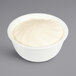 A white bowl of Philadelphia Whipped Cream Cheese